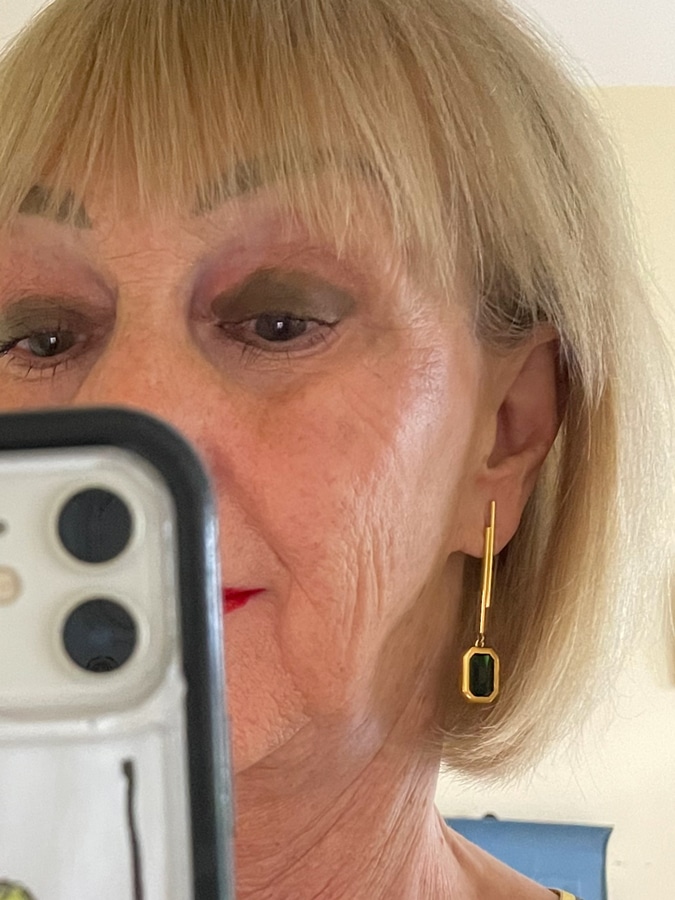 green with golden earring