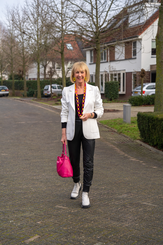 Leather trousers with white blazer