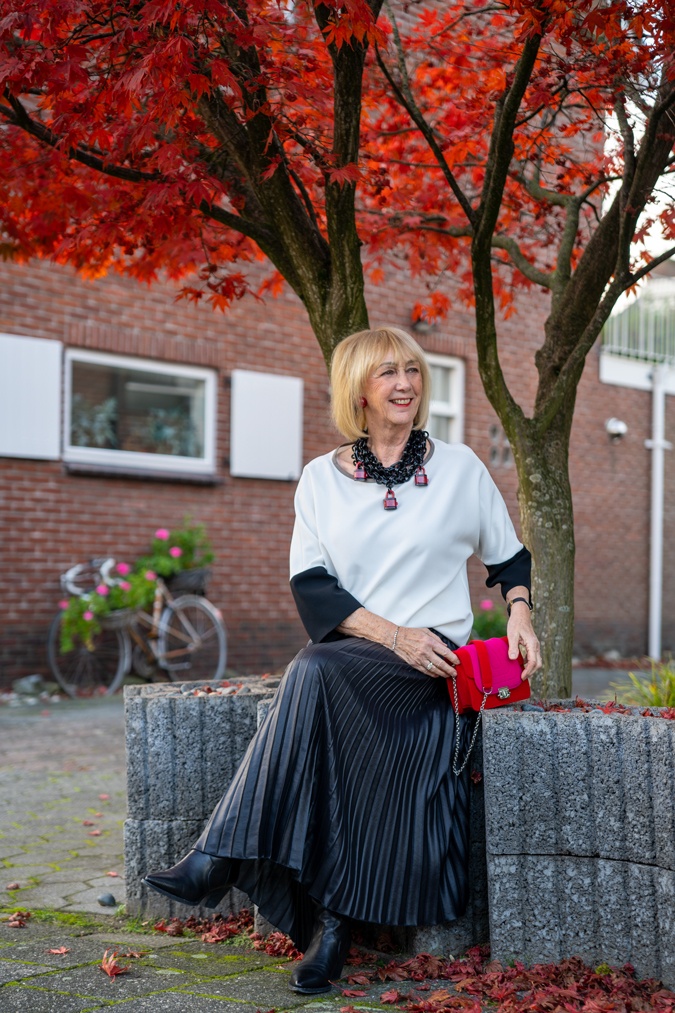 Pleated skirt and the Angela Caputi padlock