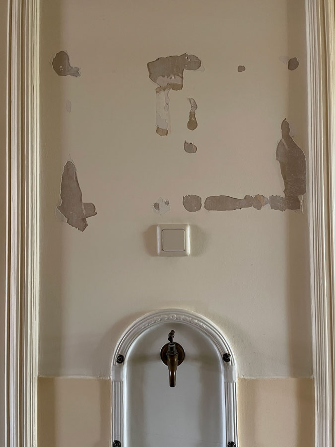 The damaged wall