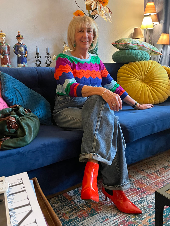 Me at Marianne's house, multicoloured jumper, jeans and orange patent leather booties